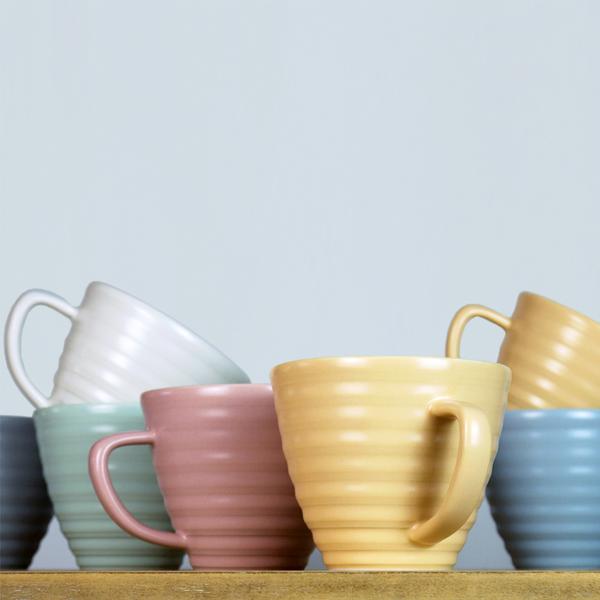 Lathed Cup by Harriet Caslin. Porcelain. White, Grey, Green, Rose, Peach 